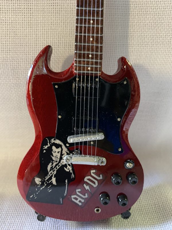 AC/DC (GIbson SG de ANGUS YOUNG)
